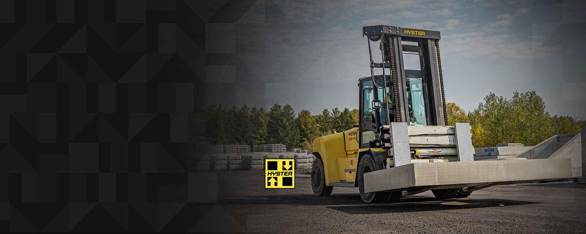 Rented Hyster forklift transports materials across the yard